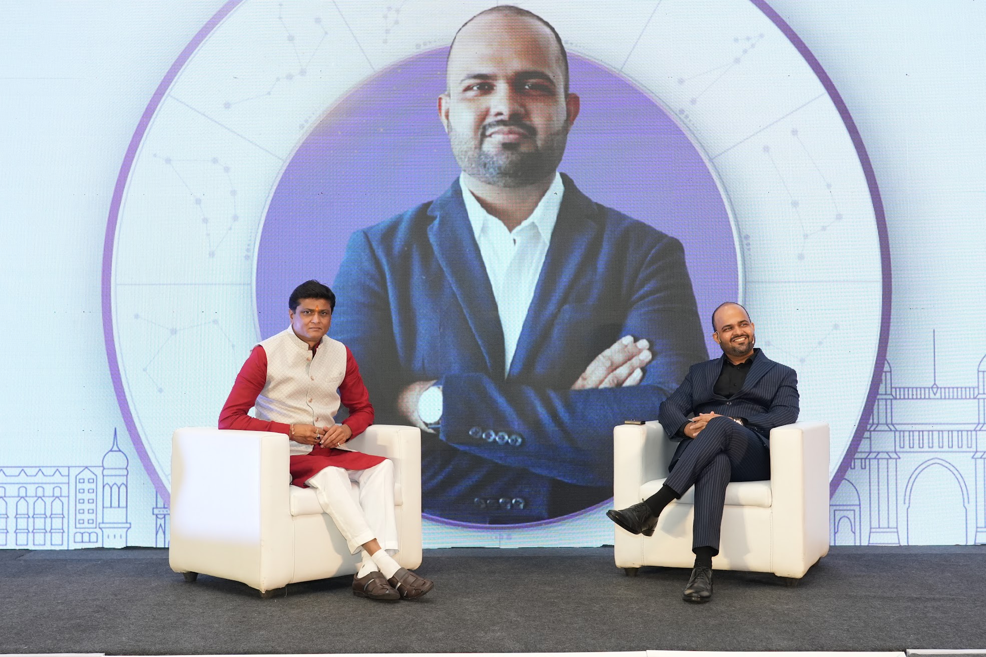 Harshubh Shah and Dr. Shrikant Jadhav on stage
